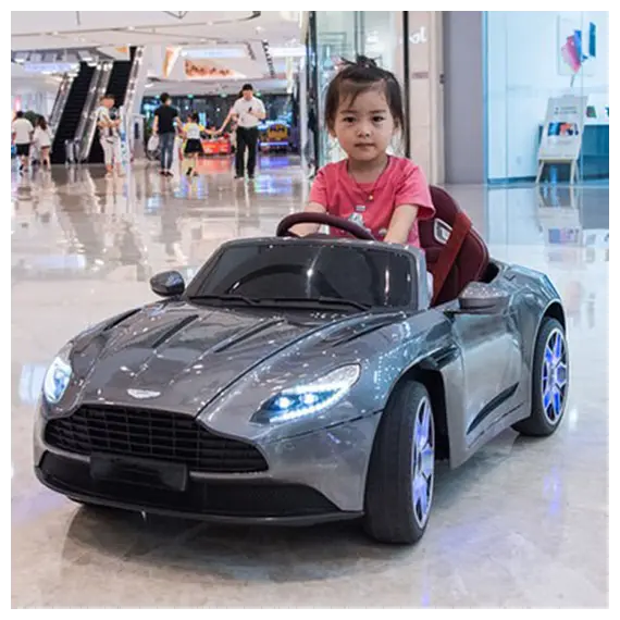 ბავშვის ელექტრო მანქანა ASTON MARTIN DB11 კაუჩუკის საბურავებით და ტყავის სკამით, 6 image - TechMall.geბავშვის ელექტრო მანქანა ASTON MARTIN DB11 კაუჩუკის საბურავებით და ტყავის სკამით, 6 image - TechMall.ge ,ბავშვის ელექტრო მანქანა ASTON MARTIN DB11 კაუჩუკის საბურავებით და ტყავის სკამით, 6 image - TechMall.ge